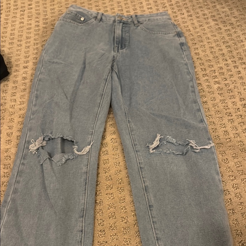 Women's Light Blue Distressed Jeans